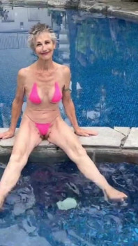 By the Hotel Pool in My Skimpy Pink Bikini