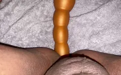 Taking a long butt plug