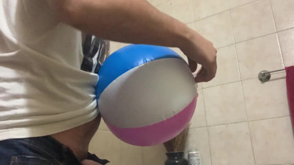 Inflatable Lovers: In the bathroom with a beach ball