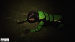 Fem Latex: Slim model masturbating in tight latex catsuit