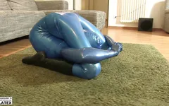 She enjoys the tight horny feeling of rubber during flexible posing