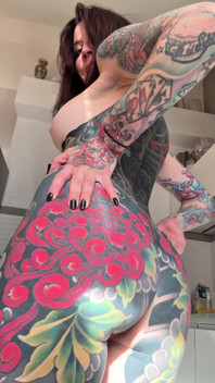 Tattooed Redhead, Showing Some Ink