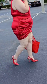 Beautiful Woman Walking Outdoors in  Parking Lot Showing off for Strangers