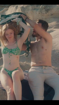 A Glimpse of Us Having Intimate Moments Outdoor on a Beach