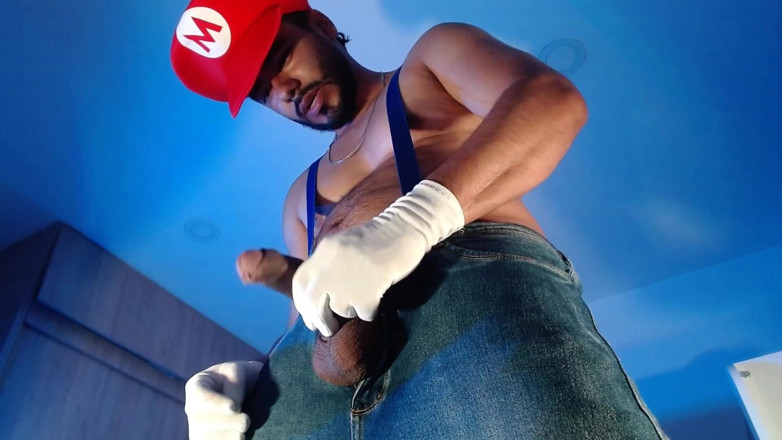 Tommhot: Dressed as Mario Bros Playing with His Plumbing Tool