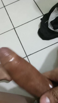 Oiled up Stroking Dick
