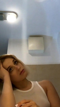 Cute and Hot Sexy Tight Pussy Cheerleader Shows Her Shaved and Wet Pussy Under Her Mini Skirt in the Bathroom