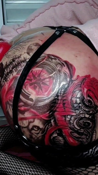 Huge Red Dildo Destroying the Ass of the Tattooed Shemale