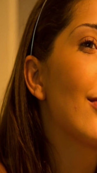 Cute teenage babe is having a great time in the kitchen