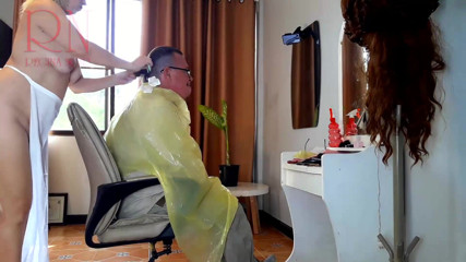 Regina Noir: Nudist barbershop. Nude lady hairdresser in an apron. The client...