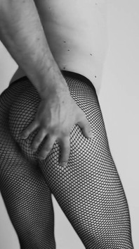 Sexy teen boy dances with only fishnets tease