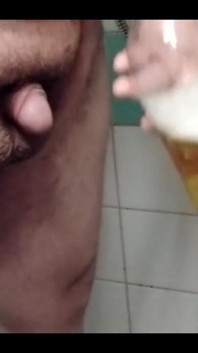 Superchub Pissing in Bottle