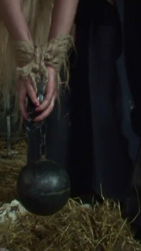 Witch Hangs Upside Down and Gets Drizzled with Black Wax