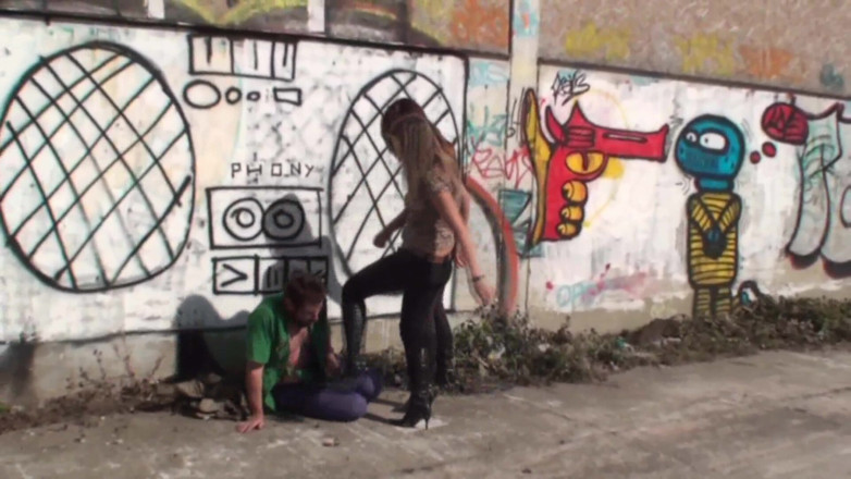 Femdom Austria: Kicking a Horny Guy in the Street