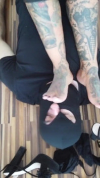 Foot slave worships his tattooed ladys feet