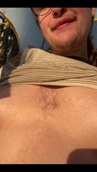 Enjoying the Evening Sun Kissing My Hairy Nipples, Chest, Tummy, and Bush!
