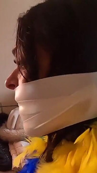 Latina Bound Tight and Gagged with Different Gags! While Wearing Feather Boa and Different Fur Parkas (smaller Size)