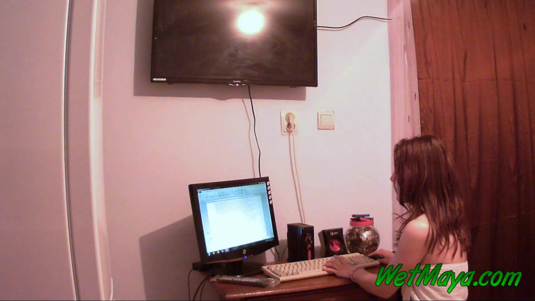 Wet Maya: Working on her computer makes Maya pee right there in...