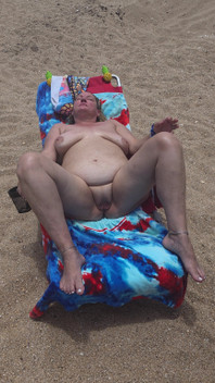 Laying with My Shaved Big Pussy Spread Wide Open on the Nude Beach to Tease Those Walking by and Looking BBW Swinger Wife Feet