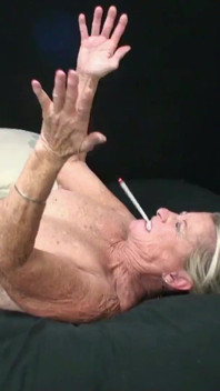 Mean and nasty stepgrandma smokes and fucks stepgrandson while busting balloons