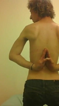 Topless Transgirl Surprised at Her Own Flexibility