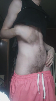 Skinny Boy Teasing His Abs on Camera