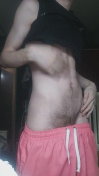Skinny Boy Teasing His Abs on Camera