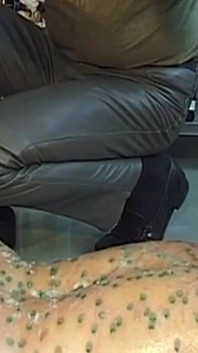 Mature MILF Enjoys Hot Wax Dripping Across Her Ass