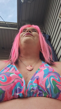 Sitting Outside Sunbathing and Teasing Men!