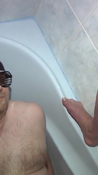 Thumbnail of Tattoed Brunette Babe with Red Lingerie Pisses on a Masked Guy in Bathroom