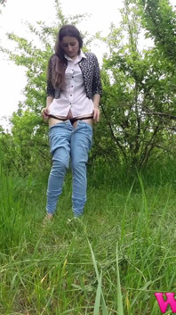 Whiping Her Wet Pussy with a Leaf Just After She Pisses in the Grass