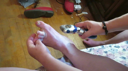BBW nurse Vicki adventures with friends: Nurse Vicki grinds her toe nails down with her electric...