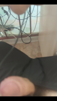 Masturbating