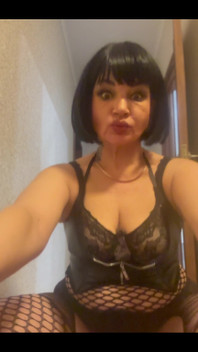 Mature Woman in Fishnet Stockings