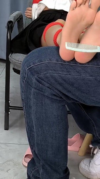 The Barefoot Girl Is Bound with Red Ropes, Tickling Her Feet, and Her Foot Fetishism