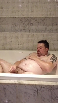 In the Big Bath Having a Wank