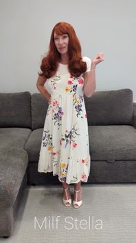 A Redhead in a Dress