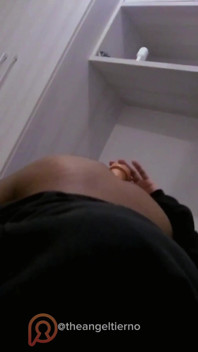 Moaning with a Dildo