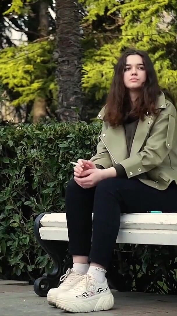 Russian Smokers: Young Brunette Is Taking an Unhurried Stroll with Allwhite 120mm Cigarette