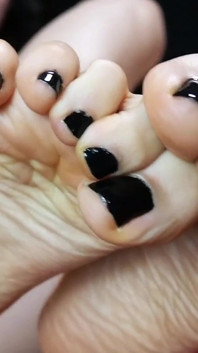 The Black and Mesmerizing Nail Polish by Rebecca Diamante