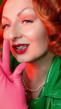 Pretty pin up model Arya and pink latex household gloves