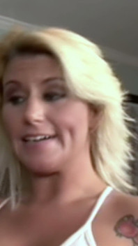 Tattooed Blonde in Leg Warmers Rides a Big Black Cock