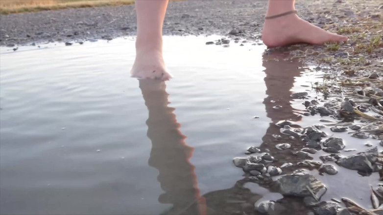 Footfetish: Bright Pantyhose and Beach Shoes in Puddle