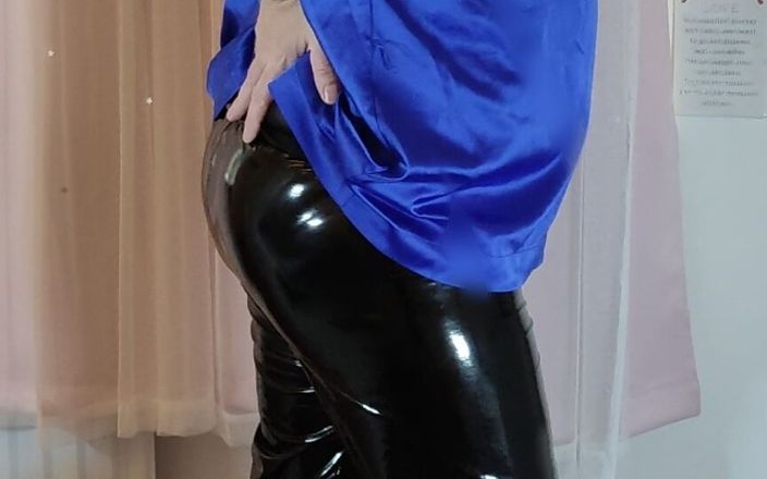 Sissy in satin: Hot crossdresser in satin blouse and pvc leggings