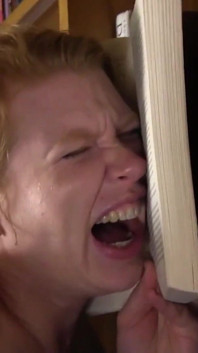 Hot lesbian action in the library with strapon