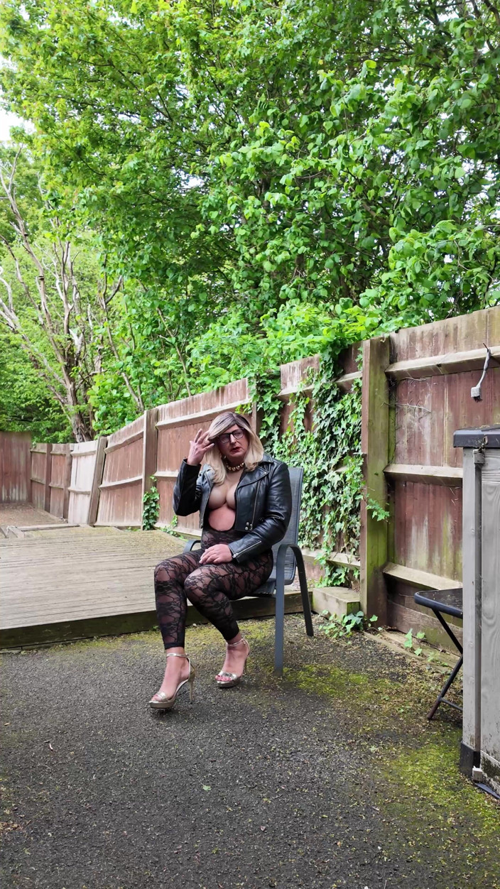 Kellycd2022: Crossdresser Kellycd2022 in Black Leather Jacket and Lace Catsuit and...