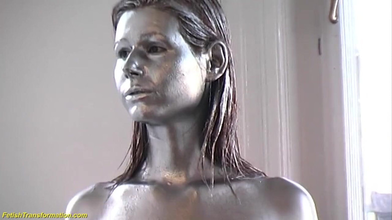 Fetish Islands: Silver metallic painted bald head statue mannequins posing
