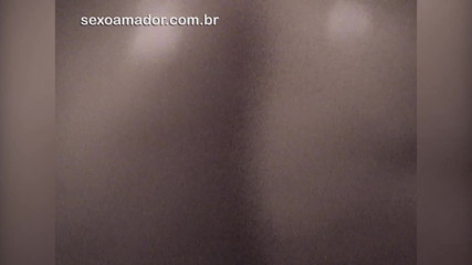 Amateurs videos: Amateur video of young brunette taking a shower with an...