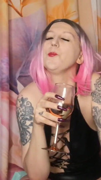 Lady Angela Femdom Goddess Spitting Into a Glas Then Pouring It Out