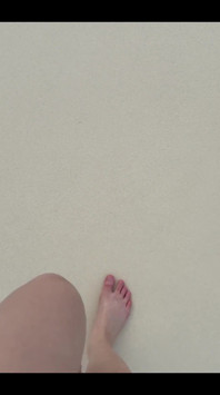 Running my bare feet on the white beach sand by the ocean.